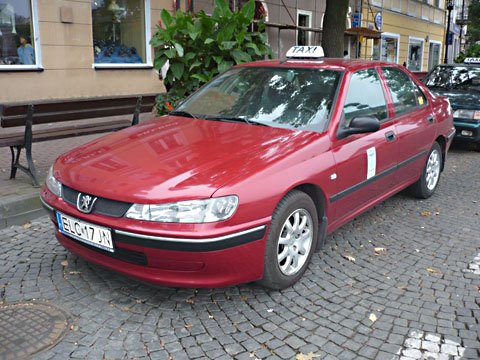 Czerwony Peugeot 406 - taksówka ŁST